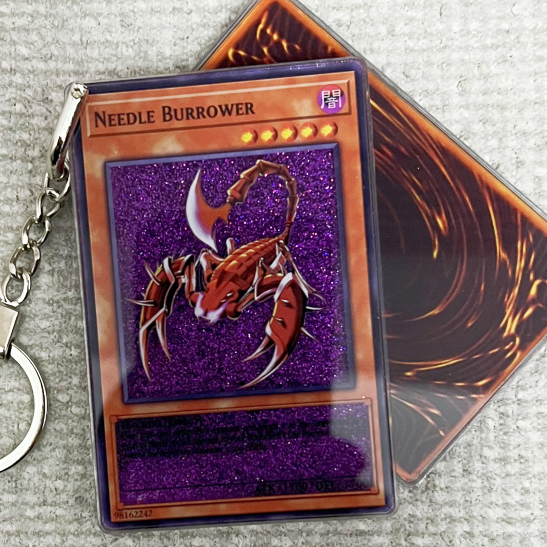 NEEDLE BURROWER Card Quicksand Keychain