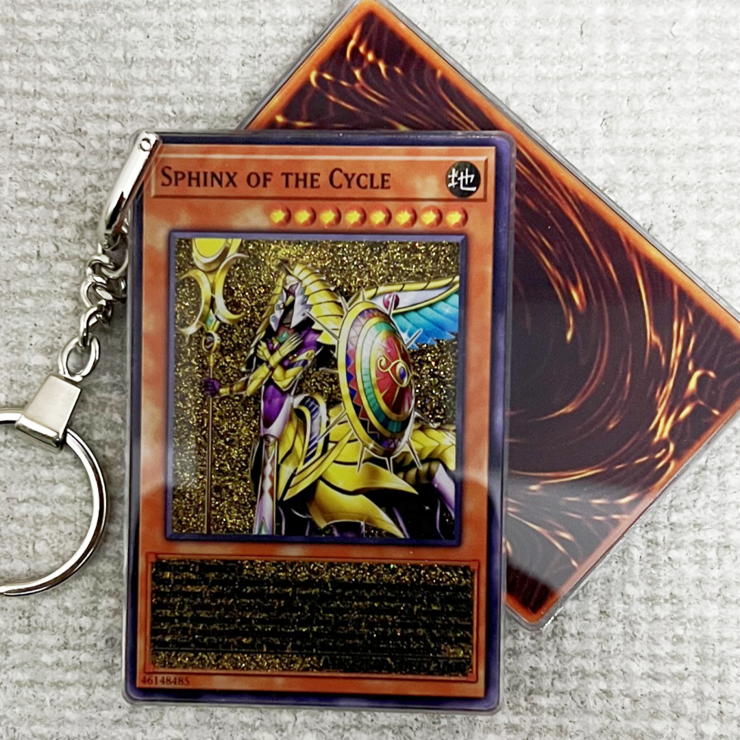 SPHINX OF THE CYCLE Card Quicksand Keychain